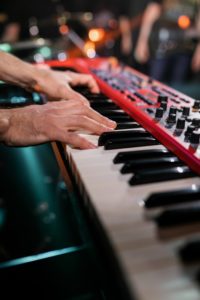 Hands playing keyboard